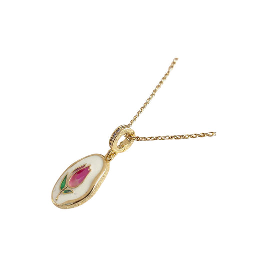 Chaîne dorée avec pendentif fleur en émail