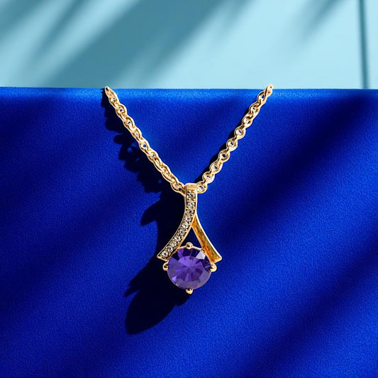 Chaîne rosé et son pendentif losange